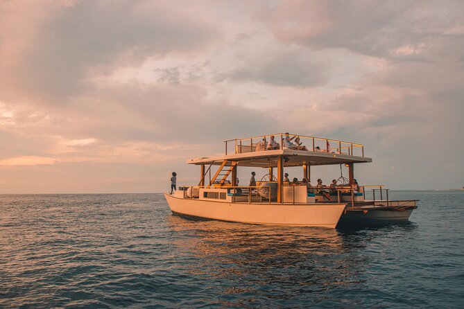 4-in-1 • Gili Islands Snorkel & Sunset Half-day Catamaran Cruise - Gili Trawangan, Gili Meno, and Gili Air by catamaran