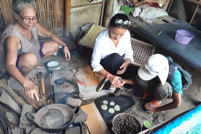 Authentic Yogya Bicycle Tour - Emping chips show how local food is made