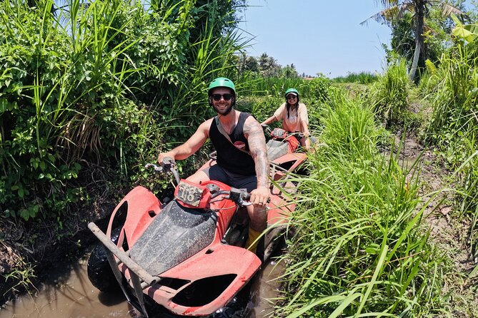 Bali ATV Ride Ubud Waterfall, Ricefield,River,Barong Cave, Lunch - Villages and forest before the mud