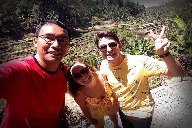 Bali Day Trip: Ubud Temples & Hidden Waterfalls - Tibumana Waterfall and its bamboo-bridge approach