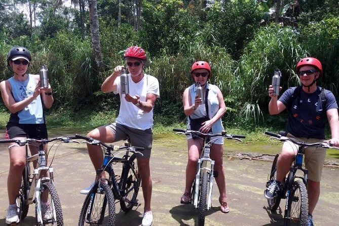Bali Eco & Educational Cycling Tour - Riding downhill through Bali’s rural heart