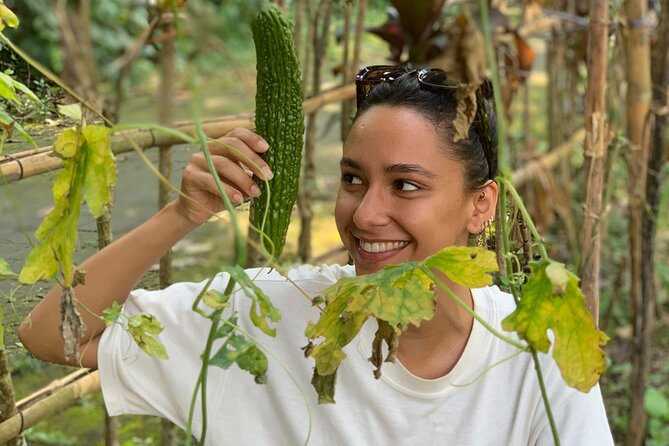 Balinese Authentic Cooking Class in Ubud - Pounding spices the traditional way