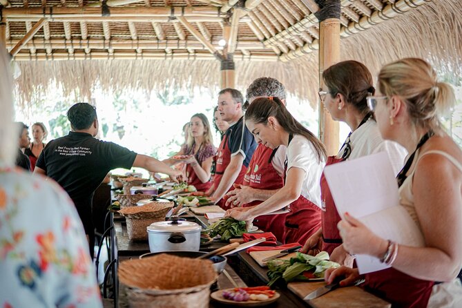 Balinese Farm Cooking Class by Pemulan Bali - Preparing six dishes in an open-air kitchen