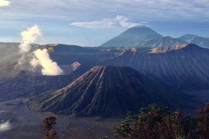 Bromo sunrise tour via Tumpang - start Malang // 1 day tour - Coban Pelangi Waterfall adds a demanding finish
