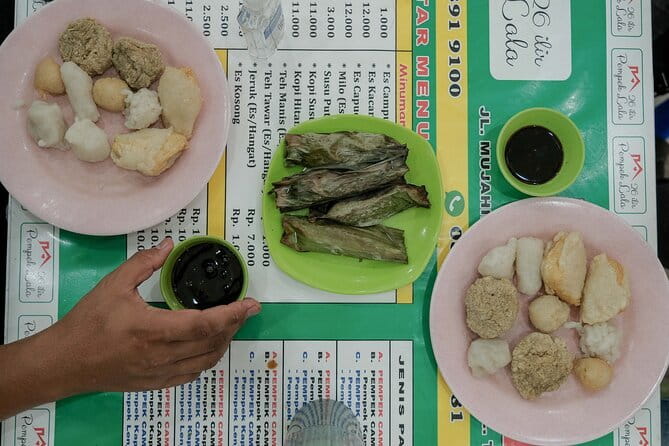 Experience Jakarta Street Food Scene with MRT Transportation - Guides who shape the evening