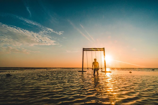 Gili Islands Private Tour: Gili Trawangan, Gili Meno & Gili Air – Full Day - The glass-bottom boat adds a second way to see the sea