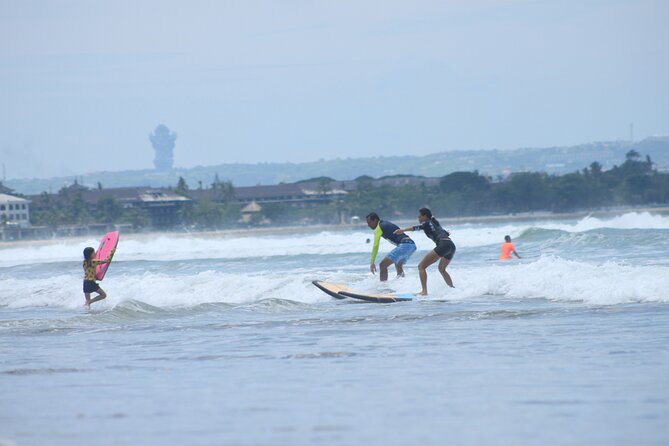 Group surf lesson by Malu Surf Bali - Who will get the most from this Kuta lesson