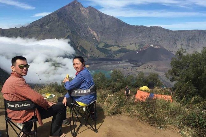 Hiking Rinjani Volcano To Crater rim Senaru 2 Days, Group - Syam Trekker - Sunset over Bali from the crater rim