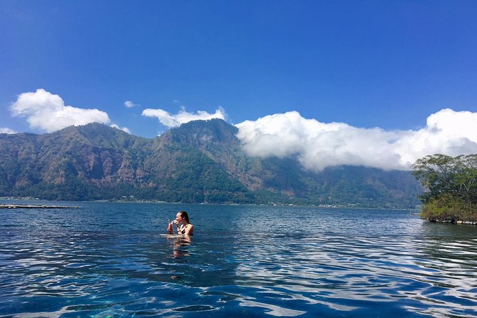 Mount Batur Sunrise Trekking & Hot Spring Tour - Sunrise, breakfast, and the cold summit