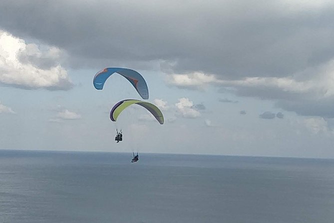 Paragliding Bali at Uluwatu Cliff with Photos/Videos - Who will get the most from this flight