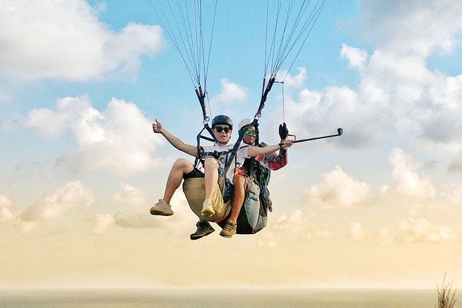 Paragliding Bali Nusa Dua cliff with Free Photo/Videos - Taking off from the cliffs near Tanah Barak