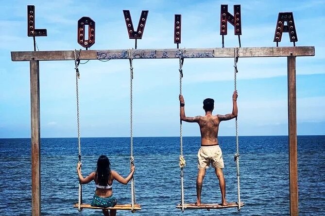 Private Full-Day Lovina Dolphin Watching and Snorkeling Boat Tour - Lovina Beach: dolphins, open water, and morning light