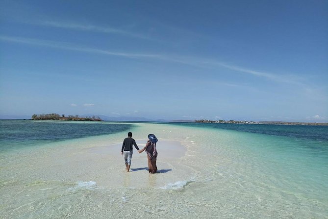Private Snorkeling Tour In Pink Beach - Tanjung Luar Port and the 30-minute wooden boat ride