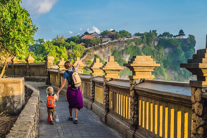 Private Tour Bali Beaches and Uluwatu Temple with Dinner - Melasti Beach, cliffs, and the sunset show