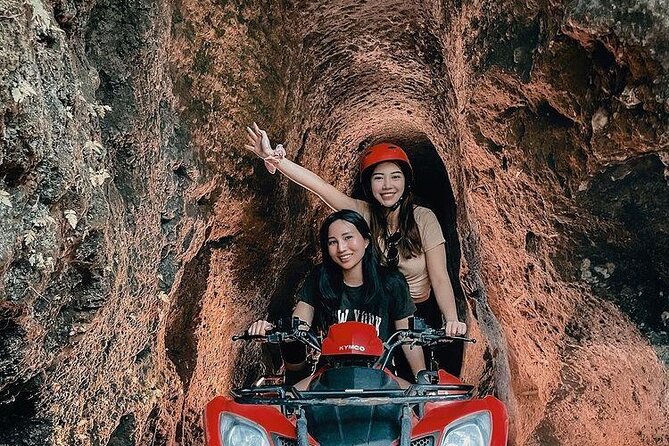 Quadbike Adventure with Tunnel and Waterfall Tour in Bali - Through the tunnel and toward the waterfall