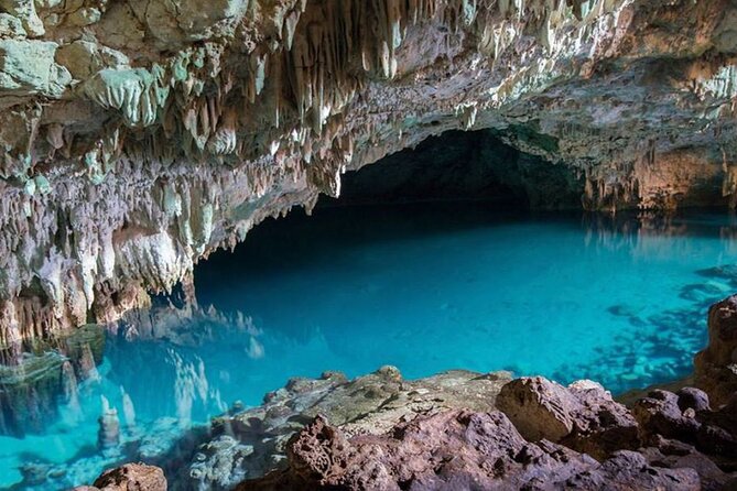 Rangko Cave & Beach Snorkeling Half Day Sharing Trip Labuan Bajo - Rangko Cave: a cool swim under the rock
