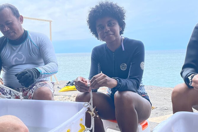 Reef Rehabilitation Course and Snorkeling - Learning to tie knots underwater