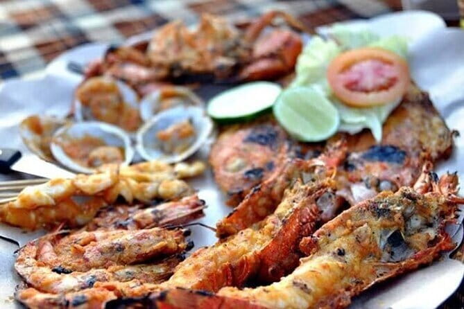 Romantic Seafood Dinner at Jimbaran Beach Bali include Sunset - Why Jimbaran sunset dining works so well