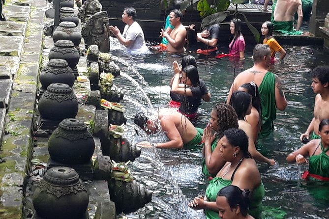 Skip the Line Tirta Empul Temple Entrance Ticket All Inclusive - Your pickup, drive, and arrival at the temple
