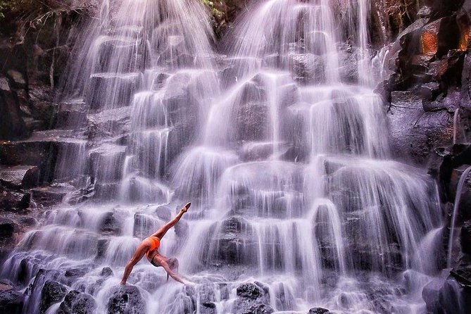 Tanah Lot Temple, Waterfall & Ubud Tour (Private & All-Inclusive) - Kanto Lampo Waterfall and its black rocks