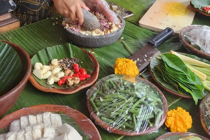 Traditional Balinese Cooking Class with Ubud Tour - A village kitchen instead of a standard food demonstration