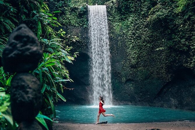 Trunyan Cemetery, Hot Spring, Penglipuran Village, and Waterfall Tour - Tibumana Waterfall, a simple final nature stop