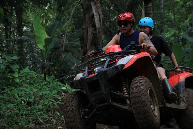 Ubud ATV Quad Bike with Ayung River Rafting Experience - ATV riding through rice fields and waterfalls