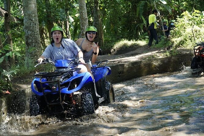 Ubud ATV Ride with Waterfall, Dragon Cave & Lunch – 2 Hours - World Ball and cliff carvings along the route