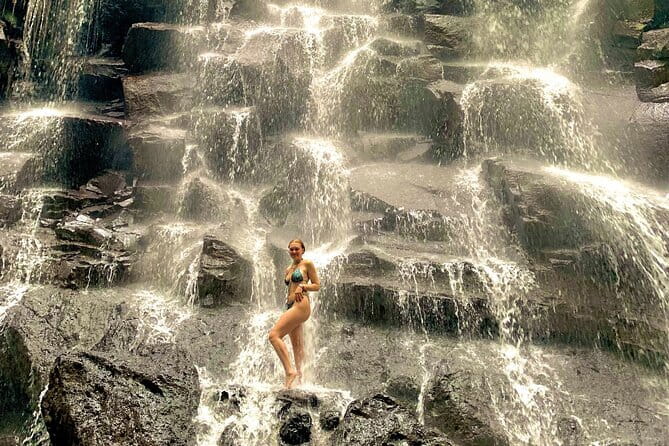 Ubud Full Day - Monkey Forest, Rice Terrace and Waterfalls Tour - Cooling off at Kanto Lampo Waterfall