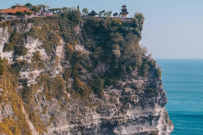 Uluwatu Temple Scenic Beaches and Fire Kecak Dance Tour - Suluban Beach and its cave-like entrance